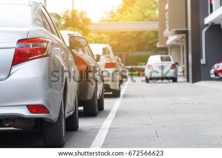 Car parking in line and  car running background