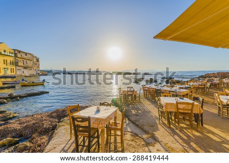 Traditional greek tavern by the sea in Chania, Greece