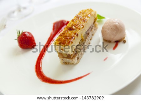 slice of apple and pieplant cake with lime / mint sorbet and strawberry sauce