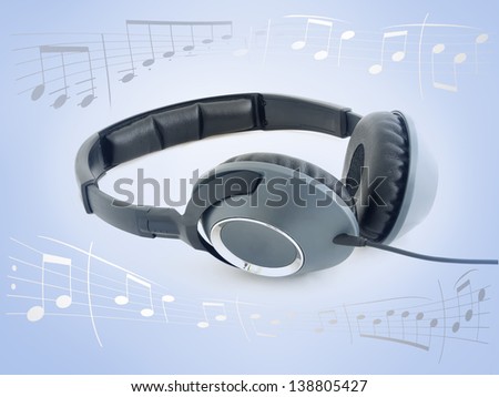 Music headphones over gradient blue background surrounded by music sheet notes