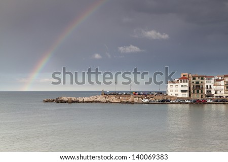 The rainbow over the sea at a fisherman\'s little town/ Rainbow after the rain, in a Costa Brava little town