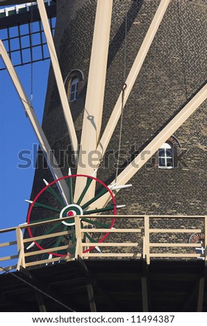 Windmill detail - wooden supporting columns at the bridge around the building