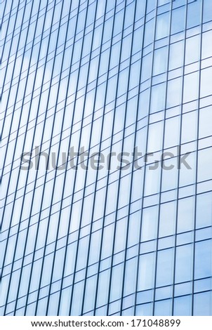 IMPERIA, ITALY - OCTOBER 2: Glass wall of office building in Milan office park in October 2, 2013.
