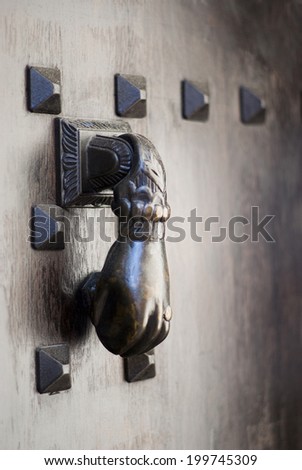 Old door knocker of a French mansion