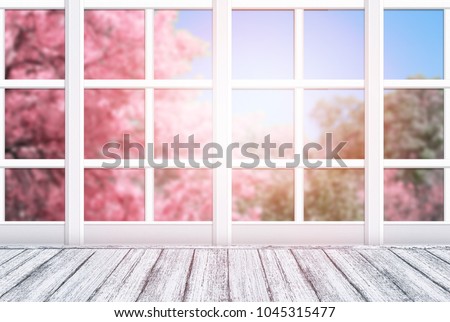 Room interior with window frame and wooden table in Shabby Chic style. Spring sunny day with pink sakura trees outside. Empty space for your decoration, text or advertising. Copy space.