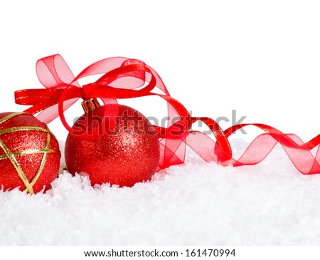 Shiny red Christmas ball with bow and place for your text