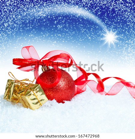 Christmas card with ball, gift box on the snow and star in the night sk