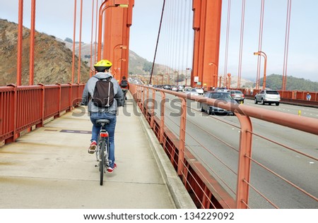 Cycling in the Golden Gate bridge, San Francisco, Usa