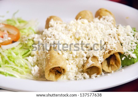Enchiladas with cheese,beans and vegetables