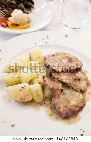 Dish of meat with beef and oil sauce
