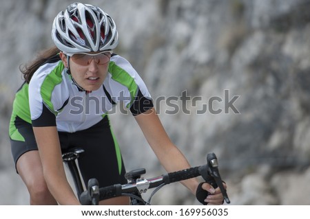 Woman On Road Cycle Scrape The Curve