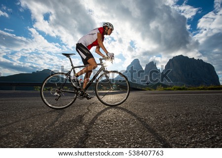 woman by road cycling competition