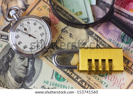 watch, magnifying glass, lock and money