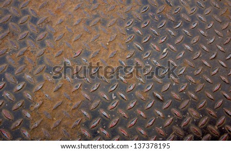 Grunge style background with metal rivets and stone plaque