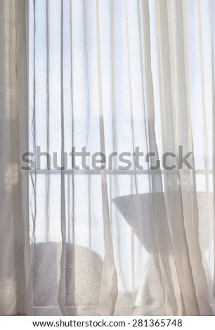 Door curtain with sunlight in the morning.