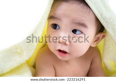 Beautiful smiling asian cute baby,Little boy with yellow  bath towel