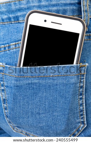 Big Smart phone in back pocket of girl\'s jeans .