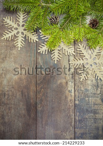 Christmas background, decoration on a rustic wooden board.
