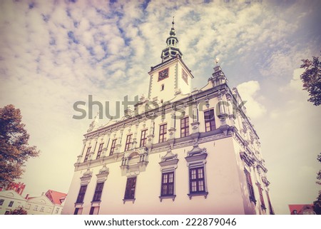 Vintage retro filtered photo of town hall in Chelmno, Poland.