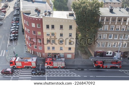 SZCZECIN, POLAND - OCTOBER 29, 2014 - Firemen brigades called for checking chimney system of apartment at Niemierzynska street.