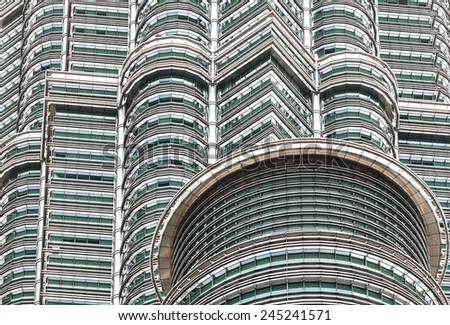 KUALA LUMPUR, MALAYSIA - DECEMBER 27, 2014: High quality close up view of  The Petronas Twin Towers, the world\'s tallest twin towers. The skyscraper height is 452m.