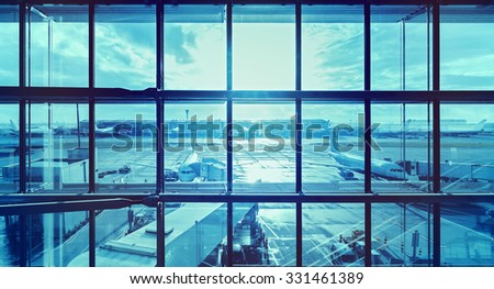 Futuristic blue picture of an airport, transportation and business travel concept.
