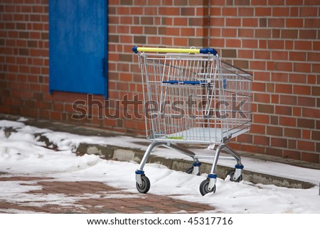 Abandoned Shopping Cart in Snow