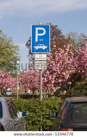 Parking Sign in Germany With Parking Ticket Monday-Friday 9am-6pm; Saturday 9am-1pm