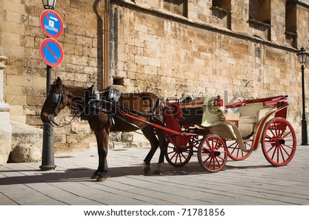 Horse drawn carriage in parking lot, Mallorca, Spain