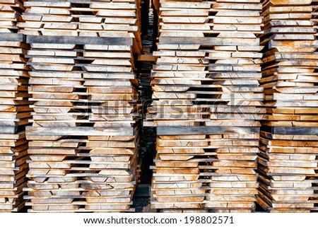 Stack of wooden boards at the lumber yard