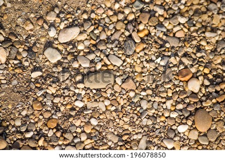Crushed granite and pebble gravel texture