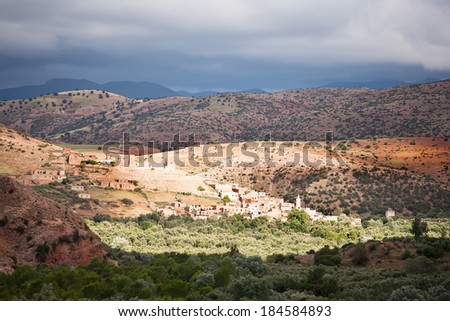 Morocco - Atlas Mountain Village - Draa Valley in the mountains. Background blue sky with clouds. Beautiful world.