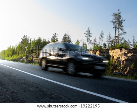 highway Scandinavia, car blurred in motion
