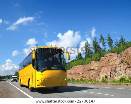 yellow tourist bus on highway Scandinavia