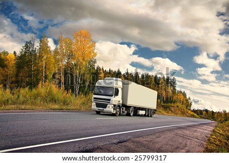 white truck on autumn highway