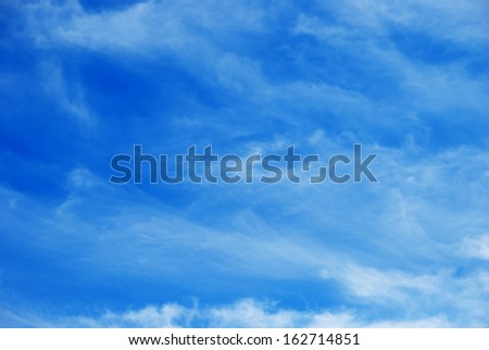 azure blue sky with white clouds of different types