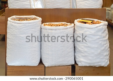 Three sacks filled with bulk food