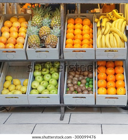 Crates with fresh fruits in juice bar