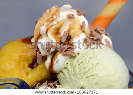 Ice cream closeup. Chocolate, waffle and fruits flavor