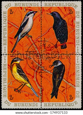 BURUNDI - CIRCA 1970: A set of four stamps printed in Burundi, shows a birds Great Grey Shrike, Common Starling, Yellow Wagtail, Sand Martin, circa 1970