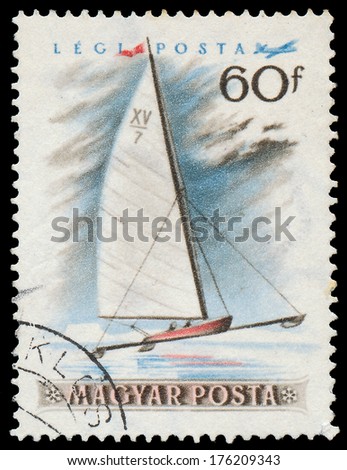 HUNGARY - CIRCA 1955: mail stamp printed in Hungary featuring winter sport ice sailing, circa 1955 one from a themed set of eight