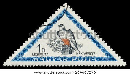HUNGARY - CIRCA 1952: Stamp with triangle shape printed in Hungary shows red-footed falcon (Falco vespertinus) from issue Hungarian birds, circa 1952