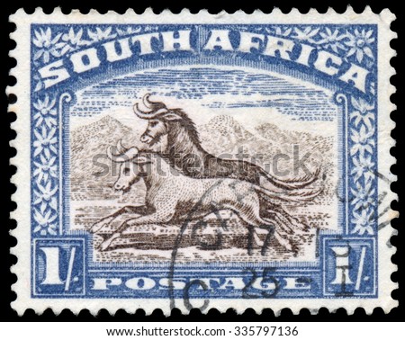 SOUTH AFRICA - CIRCA 1933: Stamp printed in South Africa shows image of two goats galloping, circa 1933