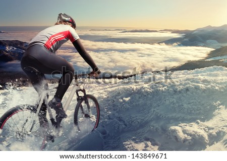Cyclist In The Mountains