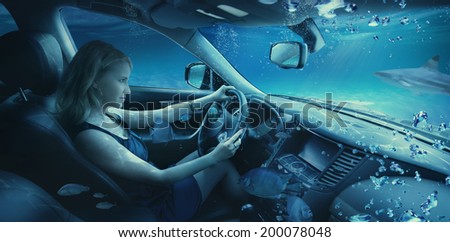 Beautiful woman underwater in the car