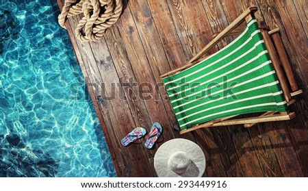 Summer vacation. Blue sandals by swimming pool. Blue sea surface with waves, texture water. Flat mock up for design.
