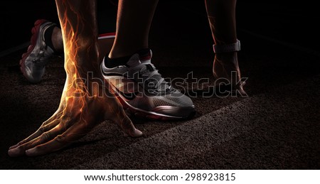 Sport. Runner. Hands on starting line. Power in the veins. Fire and energy