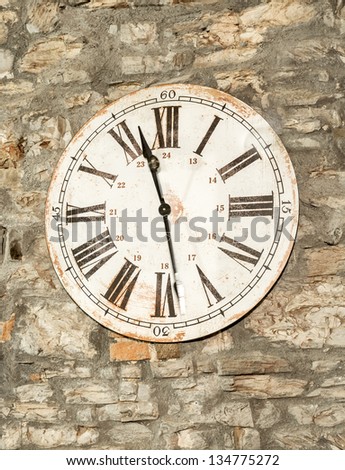A clock in an old farmhouse in Tuscany. Even if they are old will stop working but he can not stop time.
