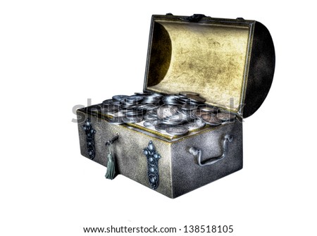 An old trunk with a small treasure trove of old silver coins in a fantasy atmosphere.