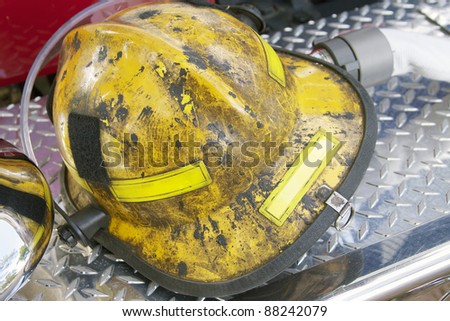 fireman helmet on fire truck bumper